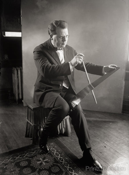 Man Plays Saw in Tux Man Plays Saw in Tux